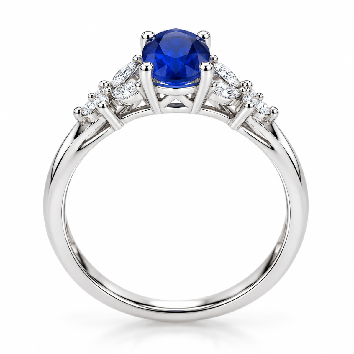 Side profile of 5x7mm oval sapphire ring showing four-prong setting and polished silver band