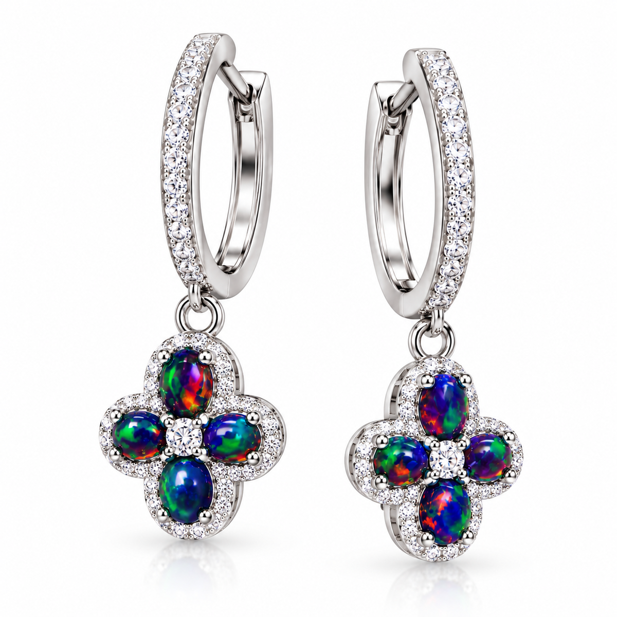 Macro view of natural black fire opal hoop earrings showing colorful play-of-color in the 4x5mm gemstones