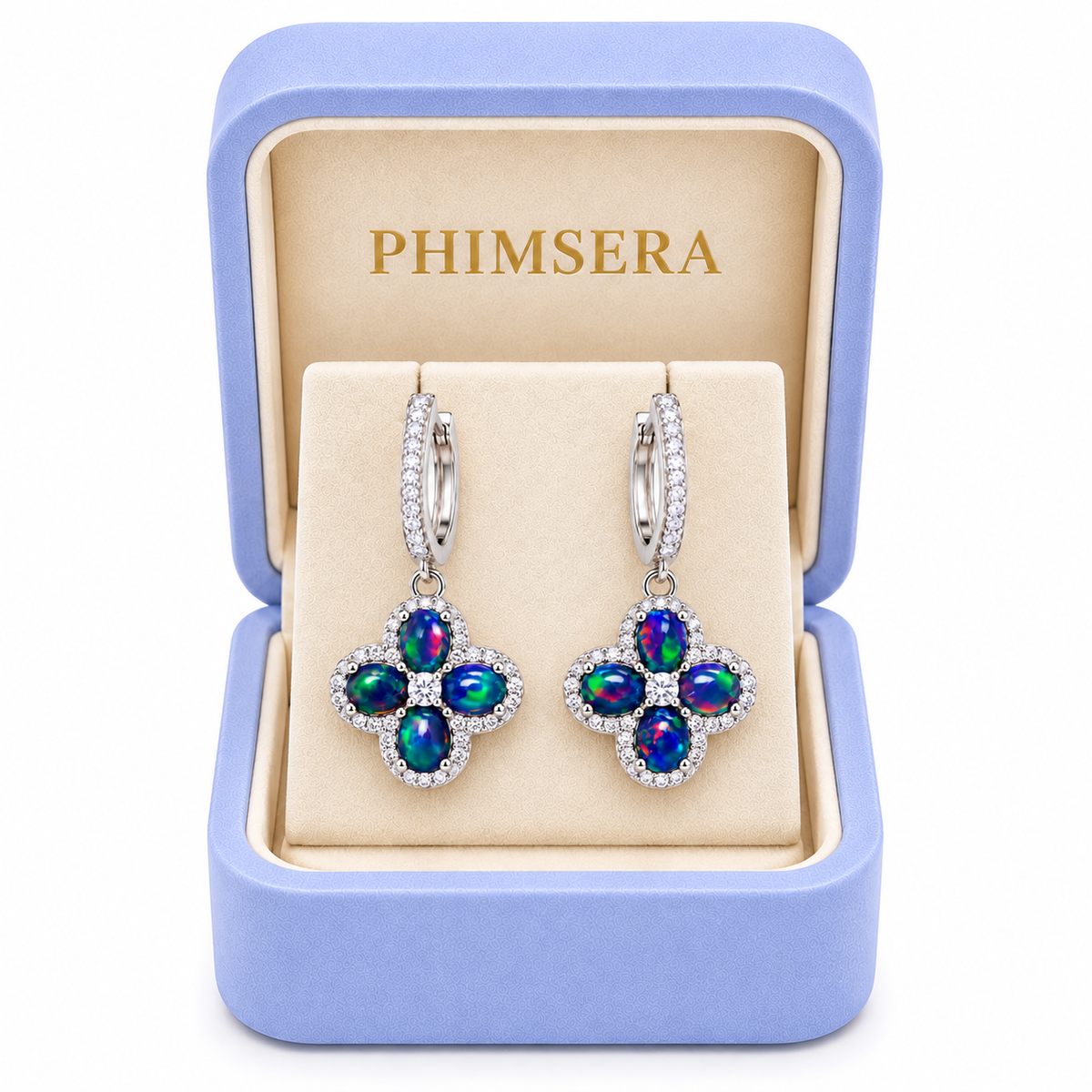 Phimsera natural black fire opal hoop earrings with 4x5mm gemstones displayed in a Phimsera jewelry box