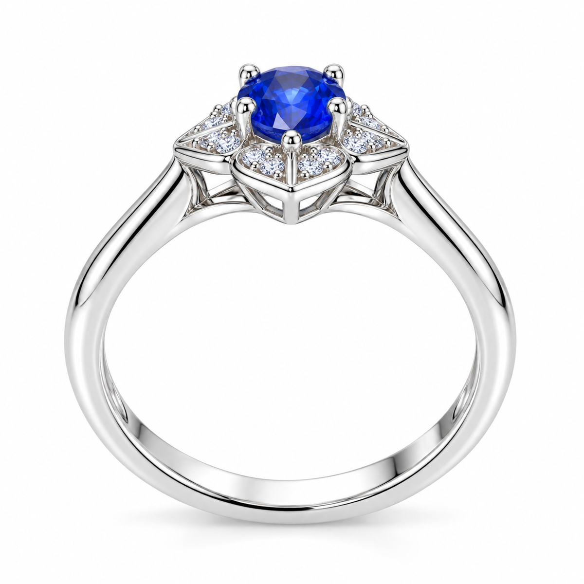 Side profile of a natural 4×5mm oval blue sapphire ring showing the floral setting and polished 925 Sterling Silver band