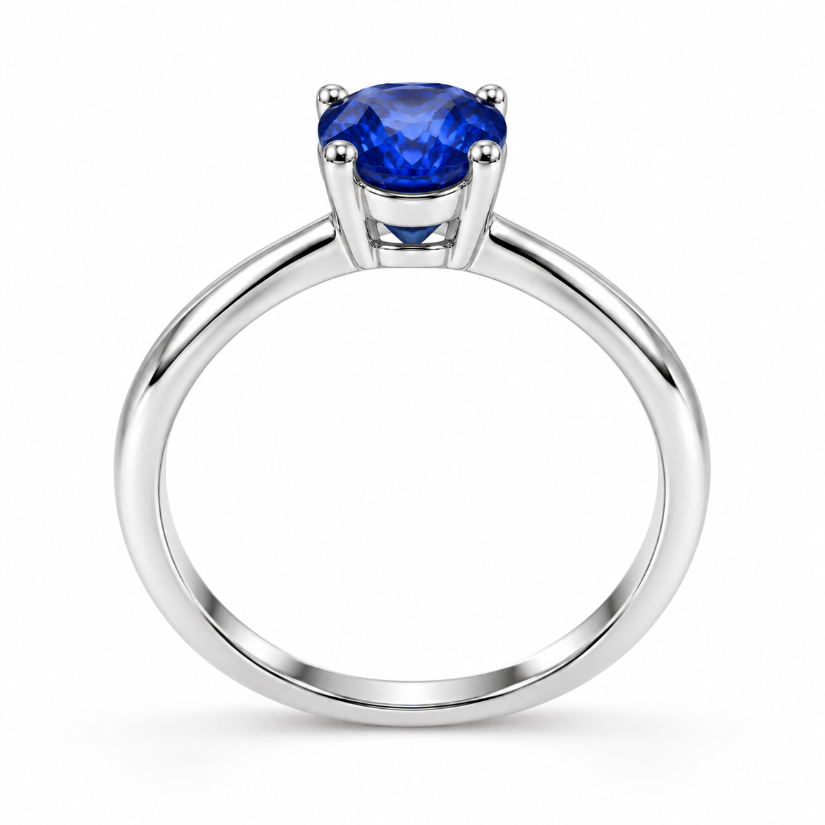 Side profile of 5x7mm sapphire solitaire ring showing four-prong setting and polished band