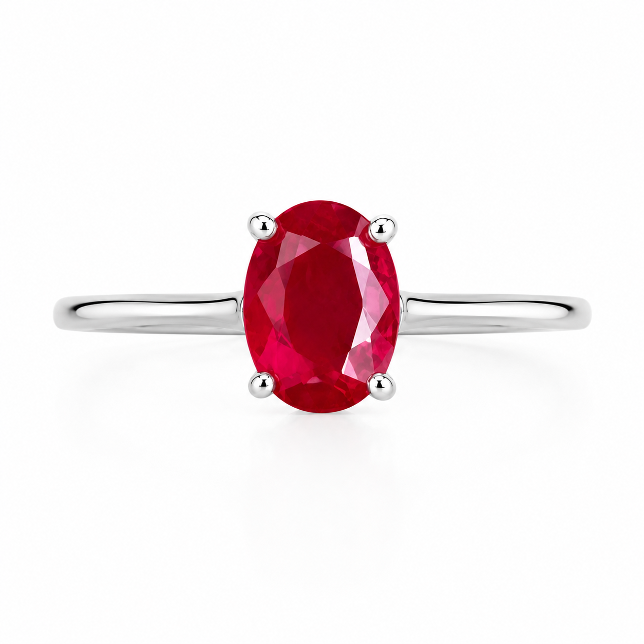 6x8mm oval cut ruby ring showing vivid red gemstone and four prong sterling silver setting