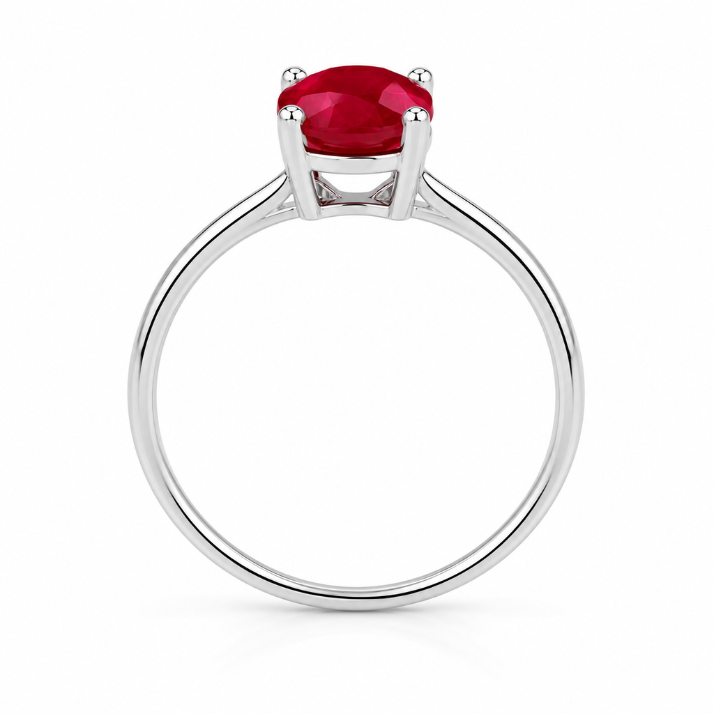 Side view of 6x8mm ruby ring showing oval gemstone and sterling silver four prong setting