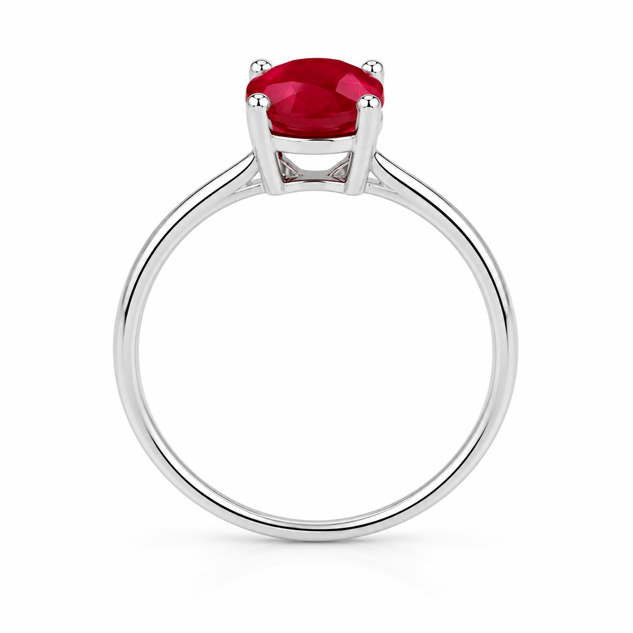 Side view of 6x8mm ruby ring showing oval gemstone and sterling silver four prong setting