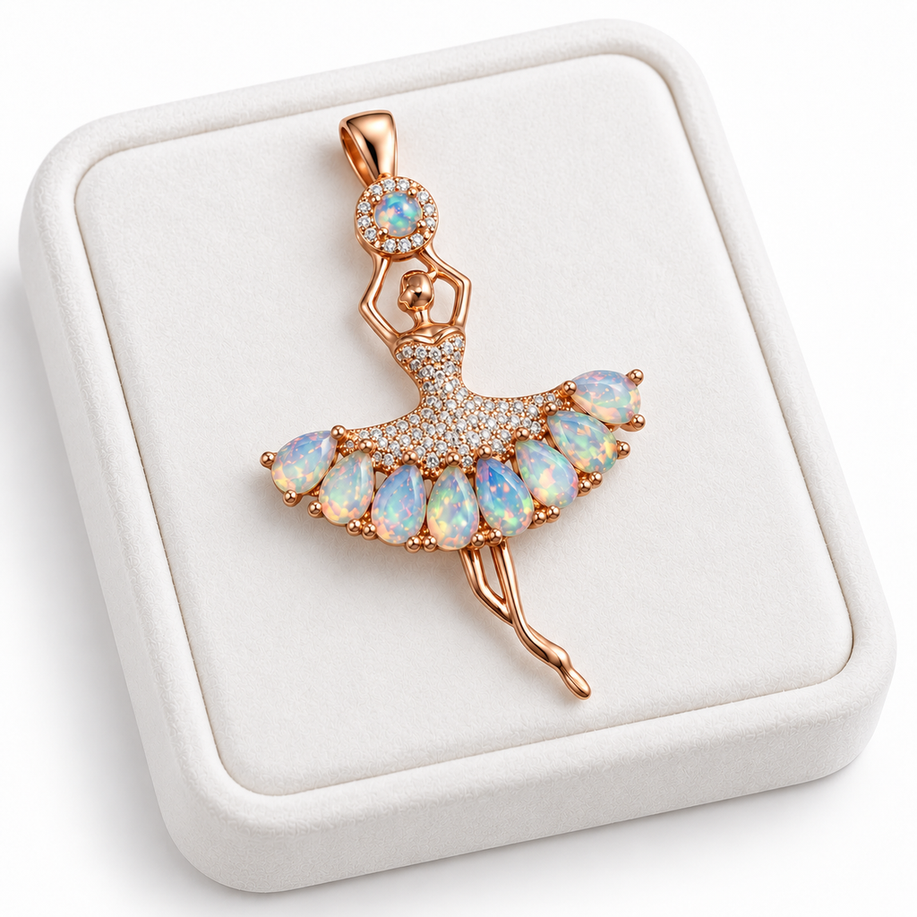 Natural fire opal ballerina pendant displayed on a white velvet jewelry tray