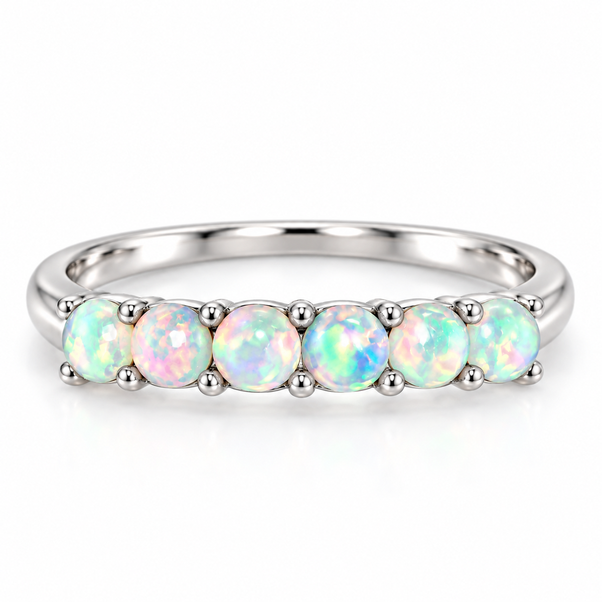 Natural 3mm fire opal gemstones arranged across a sterling silver band ring