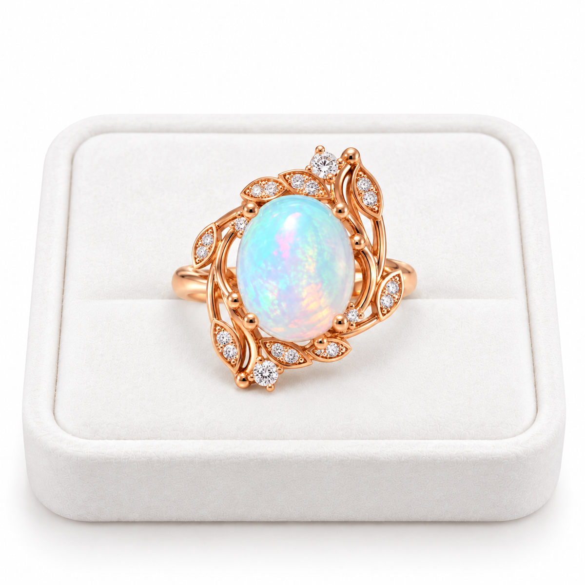 Natural 8x10mm fire opal ring displayed on a white velvet jewelry tray