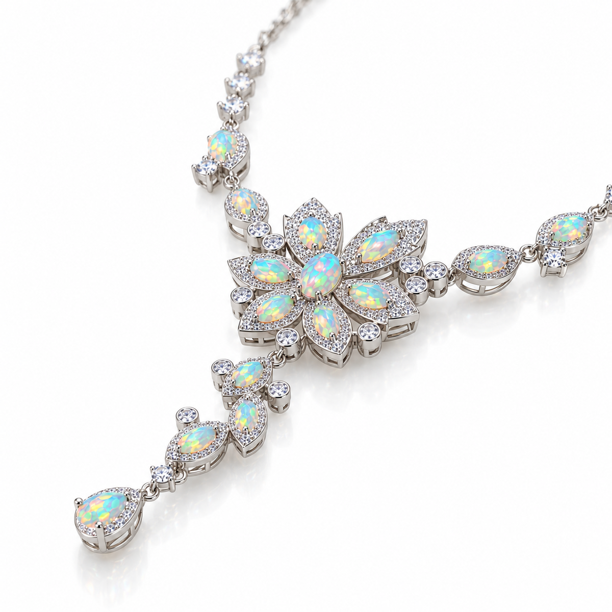 Side view of 3x5mm Fire Opal necklace with intricate silver floral details