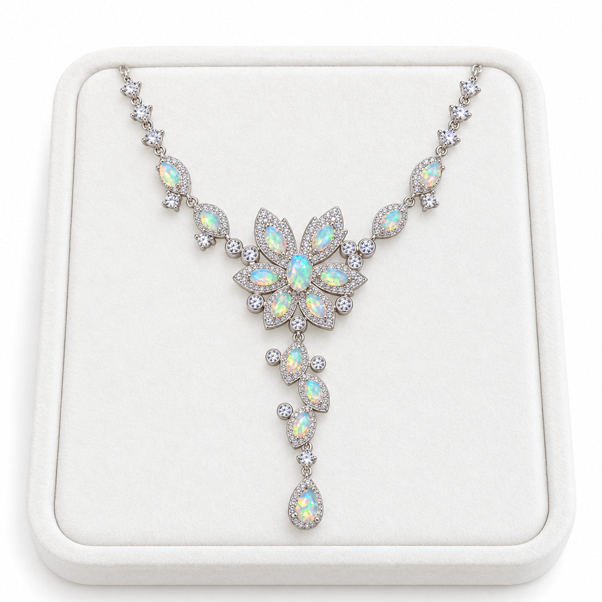 3x5mm natural Fire Opal necklace displayed on a white velvet jewelry tray