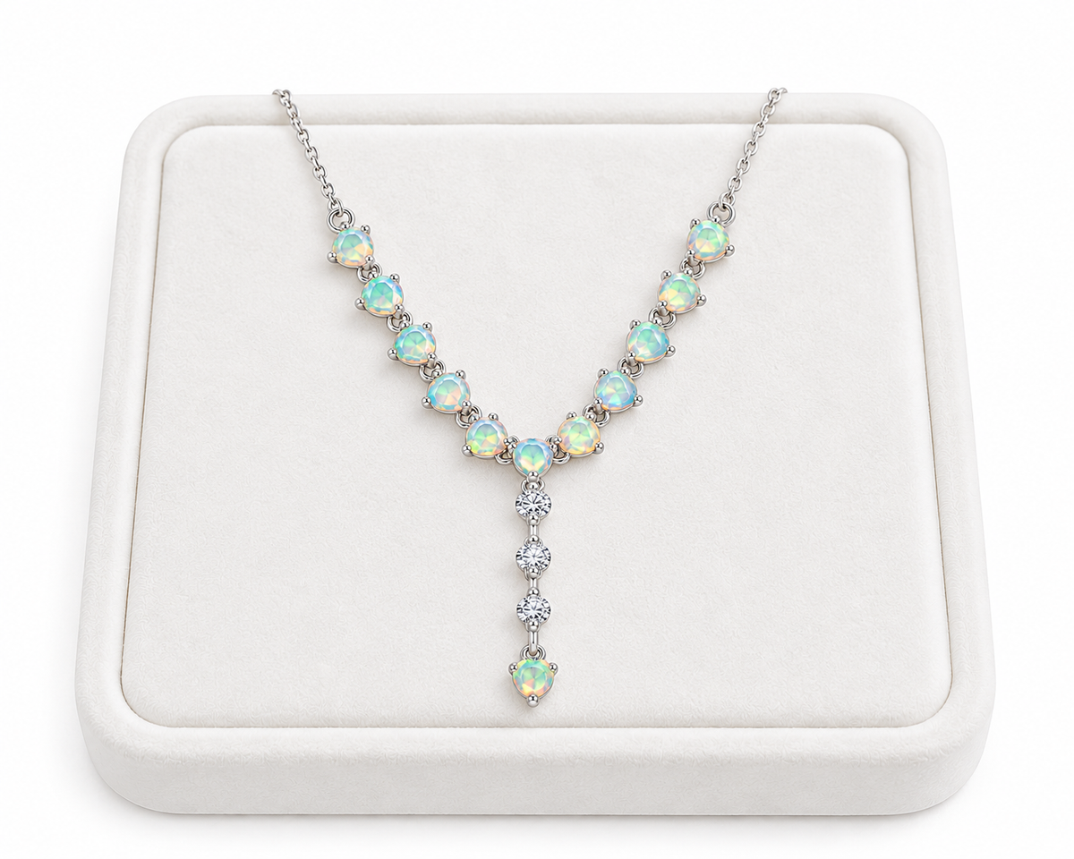 Natural 3mm opal necklace displayed on a white velvet jewelry tray