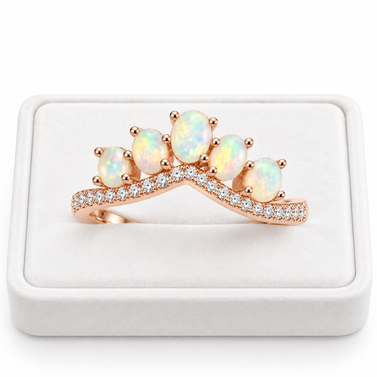 3x4mm natural fire opal ring displayed on a white velvet jewelry tray