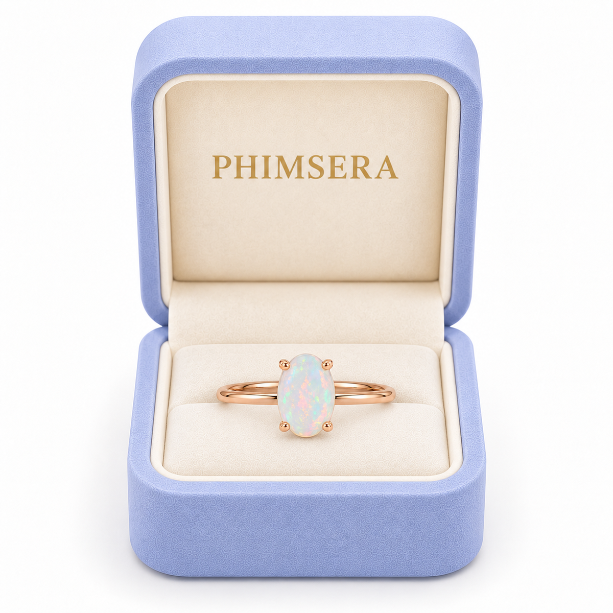 5x7mm natural opal solitaire ring presented in a Phimsera jewelry box