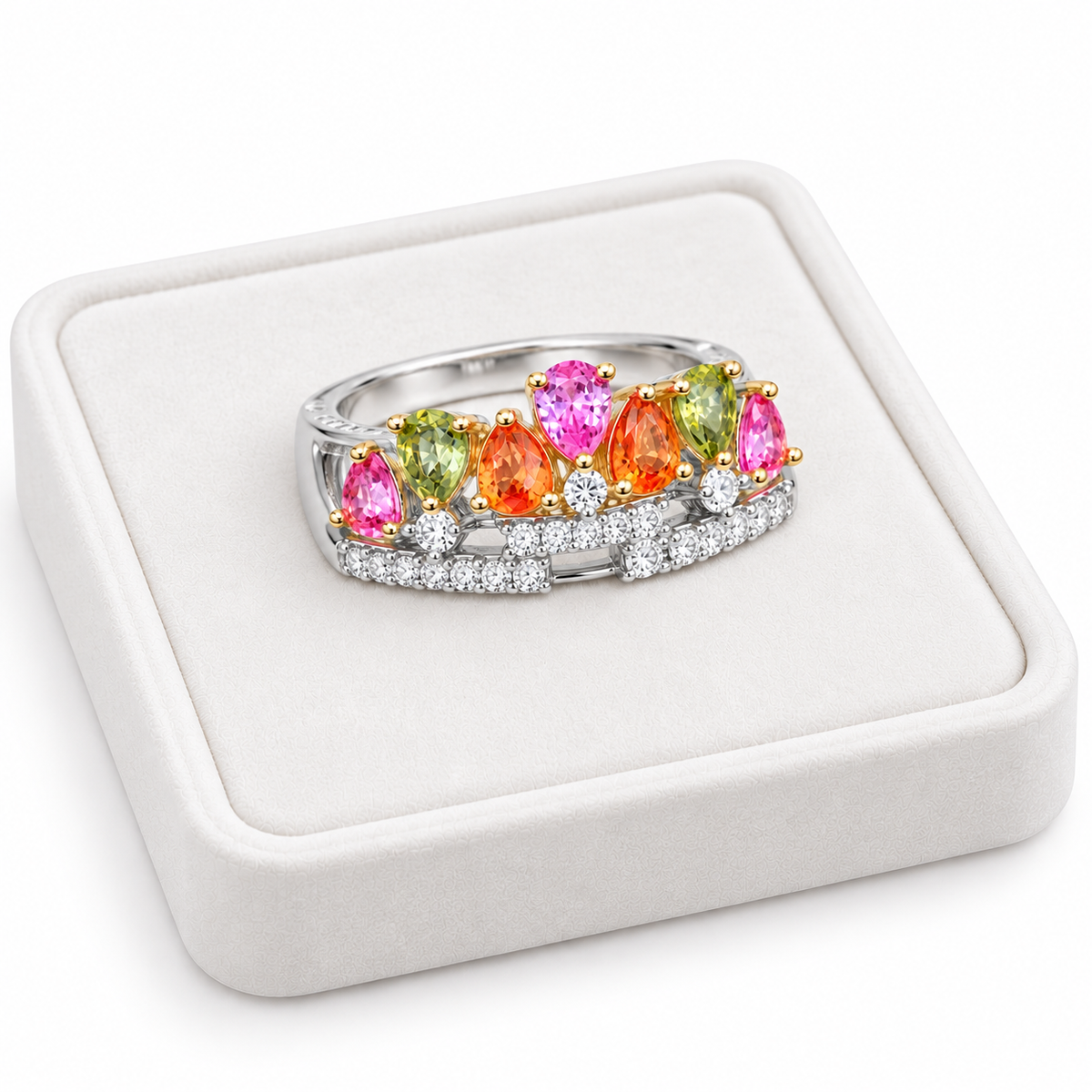 3x4mm natural multicolor sapphire ring displayed on a white velvet jewelry tray
