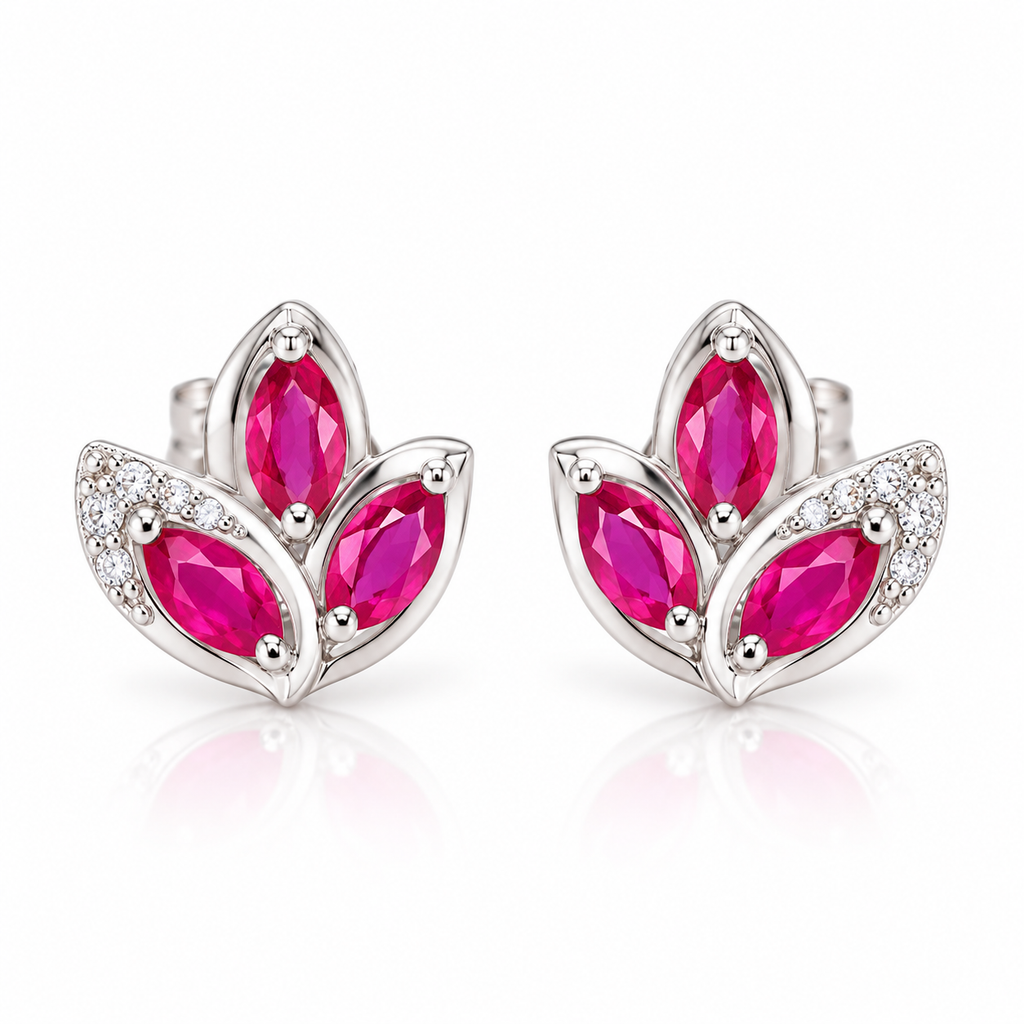 Natural pink ruby marquise stud earrings featuring three 2.5×5mm ruby gemstones per earring in a floral-inspired design on a white background.