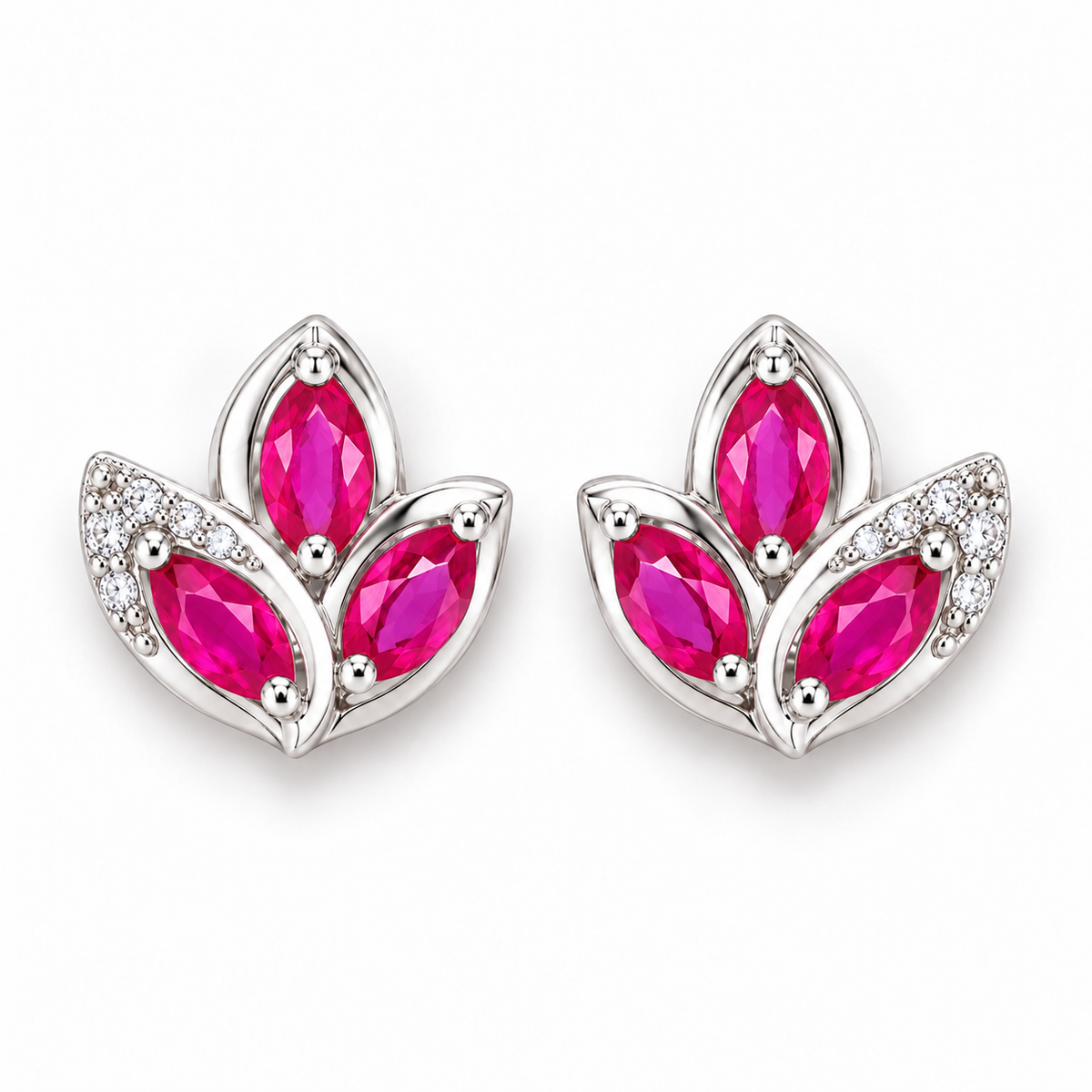 Top-down view of natural pink ruby marquise stud earrings showing the vivid pink faceted gemstones and floral-inspired arrangement.