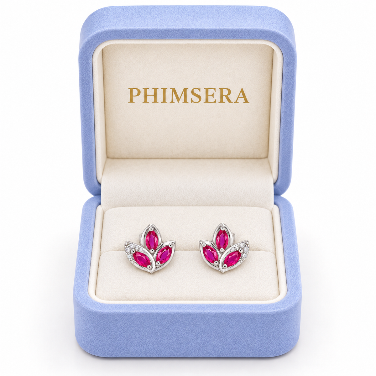 Phimsera natural pink ruby marquise stud earrings presented in an elegant jewelry box with a soft ivory interior.