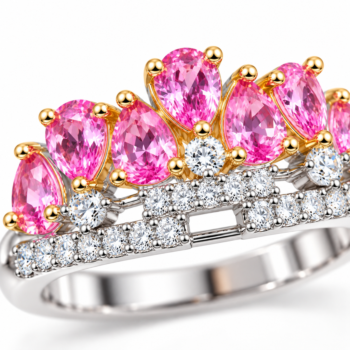 Macro view of 3x4mm pear-cut pink sapphire gemstones in crown ring setting