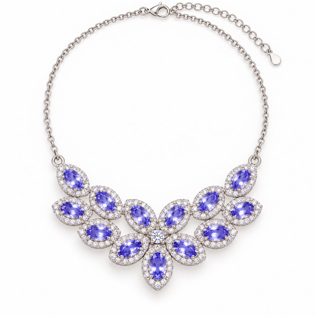 Top-down view of a natural purple tanzanite floral necklace with multiple 3×5mm oval gemstones and sparkling accent stones in 925 Sterling Silver.