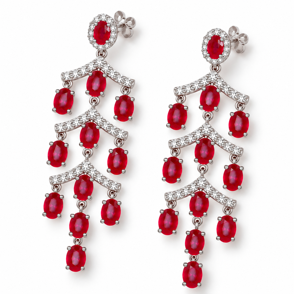 Top-down view of natural ruby chandelier earrings with 3×4mm oval ruby gemstones and cubic zirconia-accented decorative components.