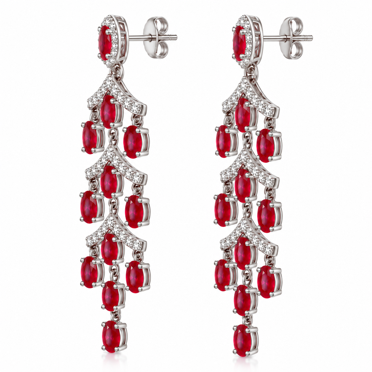 Side profile of Phimsera ruby chandelier earrings showing the layered drop construction, oval ruby gemstones, and cubic zirconia accents.