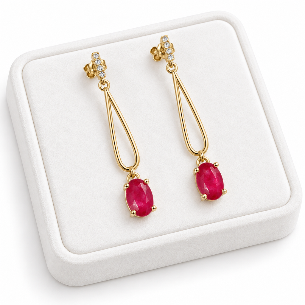 Phimsera natural ruby drop earrings displayed on a premium white velvet jewelry tray.