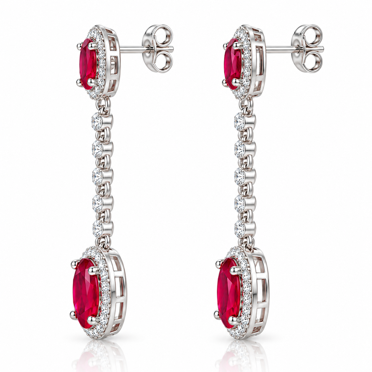 Side profile of Phimsera ruby drop earrings showing the elongated earring design and gemstone setting details