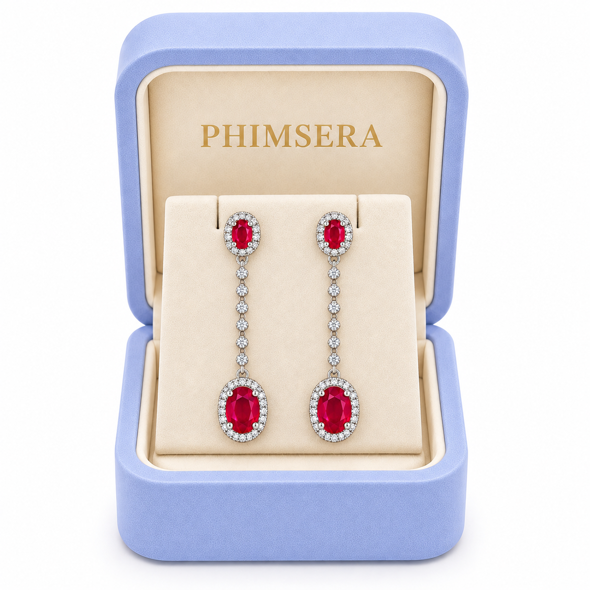 Phimsera natural ruby drop earrings presented in a branded jewelry box