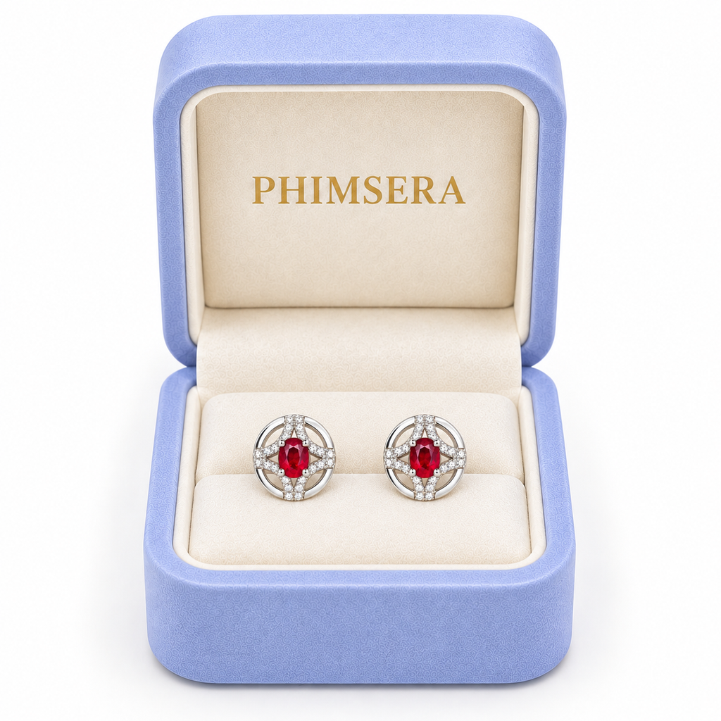 Phimsera natural ruby stud earrings presented in the branded jewelry box with elegant packaging and a clean white background.