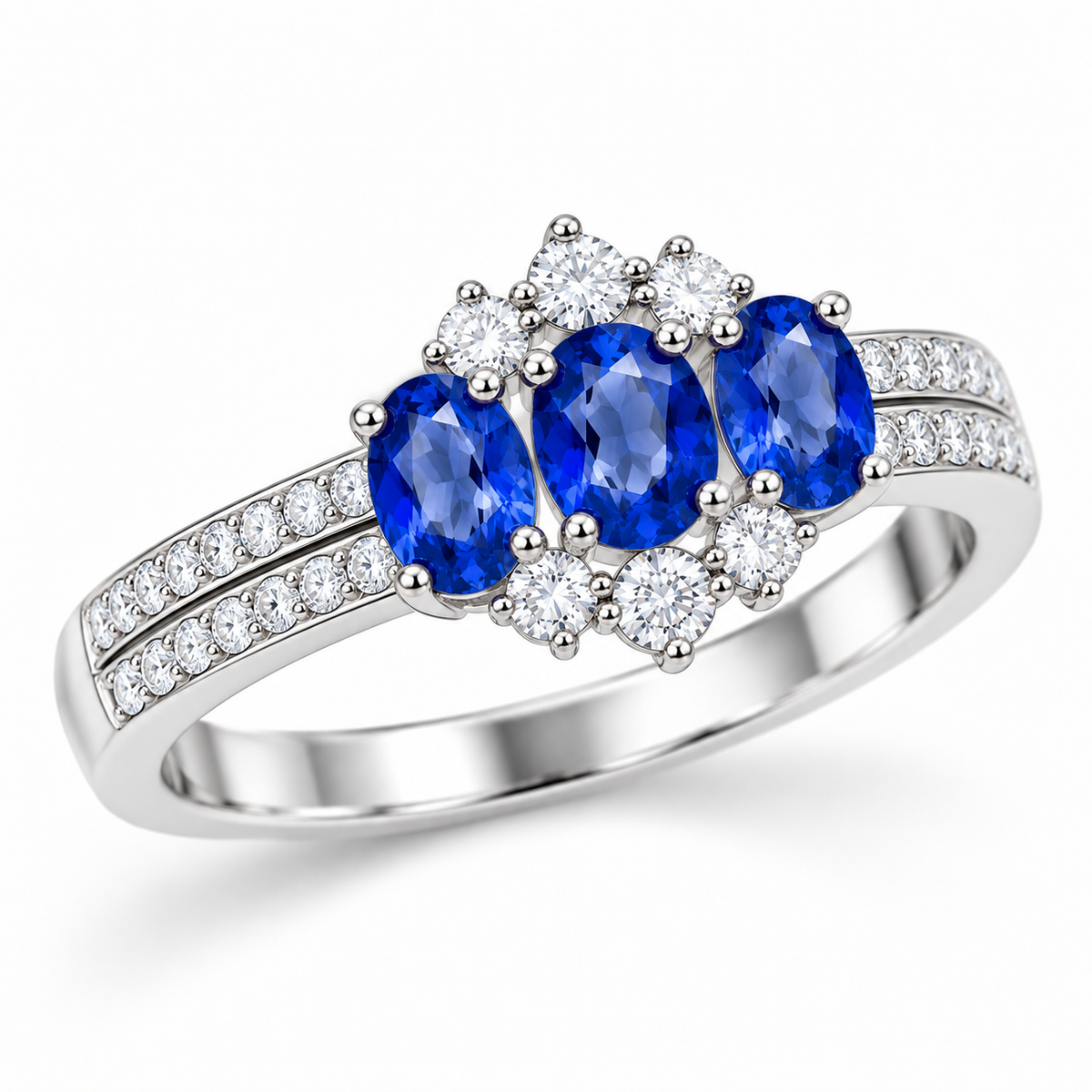 Angled view of 4x5mm oval blue sapphire ring with detailed floral gemstone setting