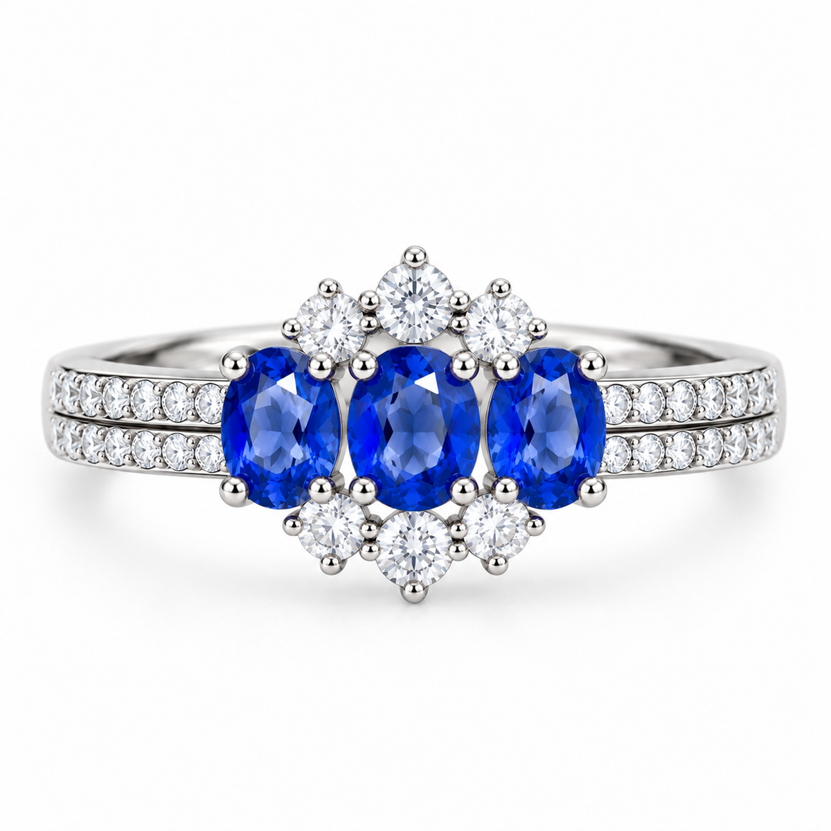 Top view of 4x5mm sapphire ring featuring oval blue gemstones and clear accent stones