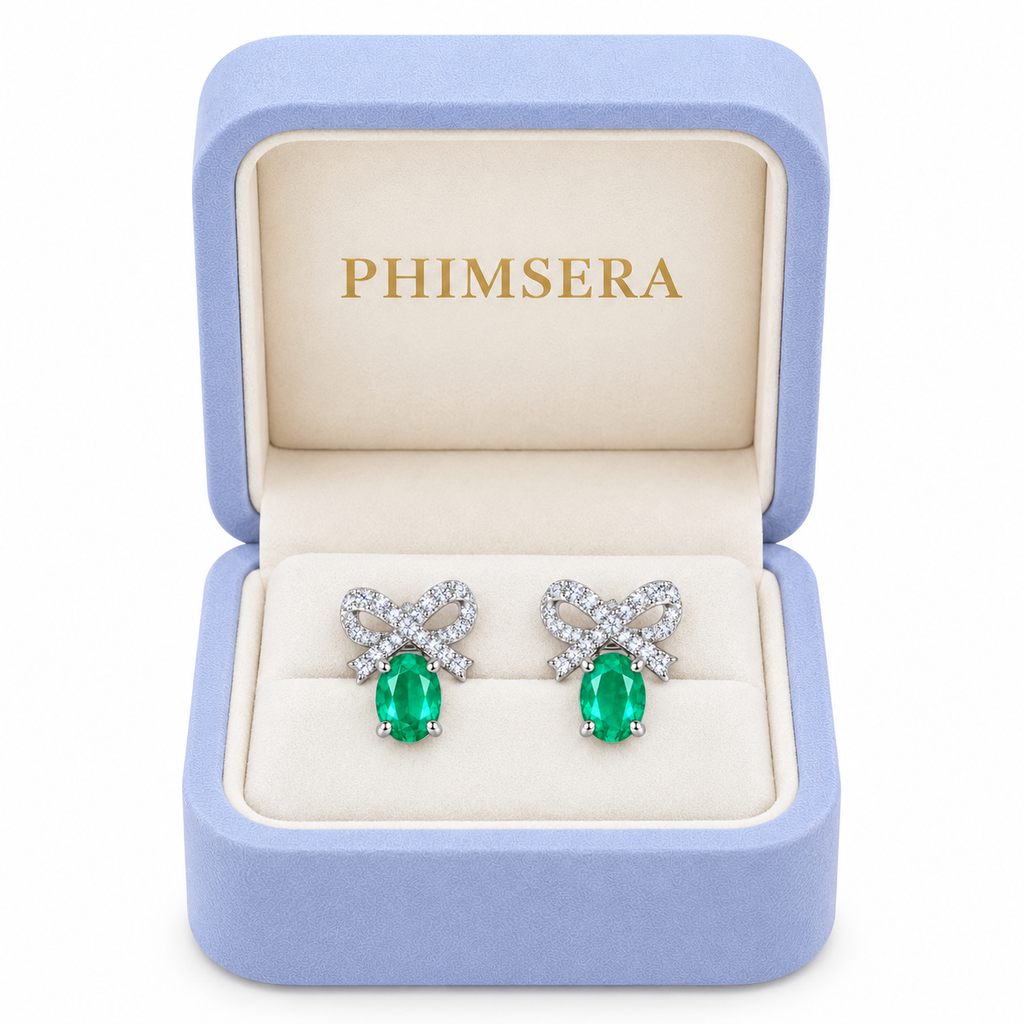 Natural Emerald 4x5mm Oval Bow Stud Earrings in 925 Sterling Silver with CZ