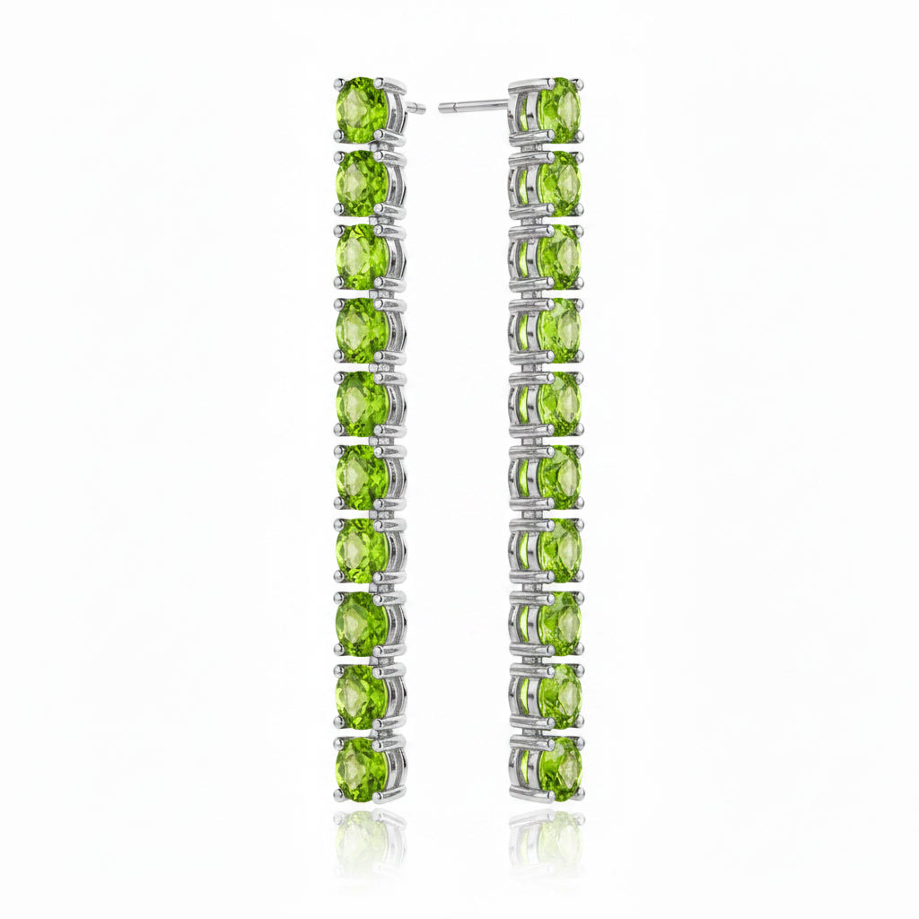 Natural Peridot dangle earrings shown from a three-quarter angle