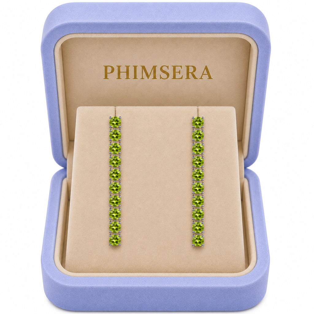 Natural Peridot dangle earrings presented in a Phimsera jewelry box