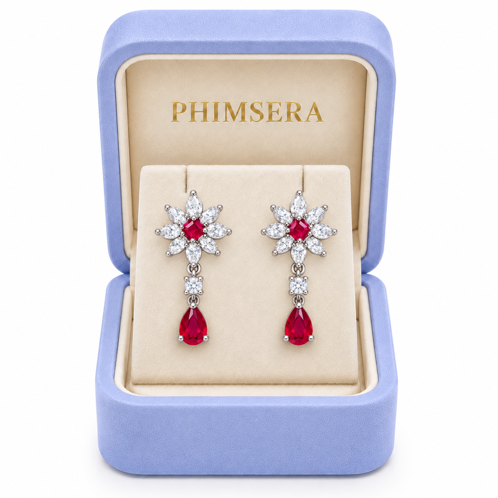 Phimsera ruby floral drop earrings presented in an elegant Phimsera jewelry box against a clean white background.