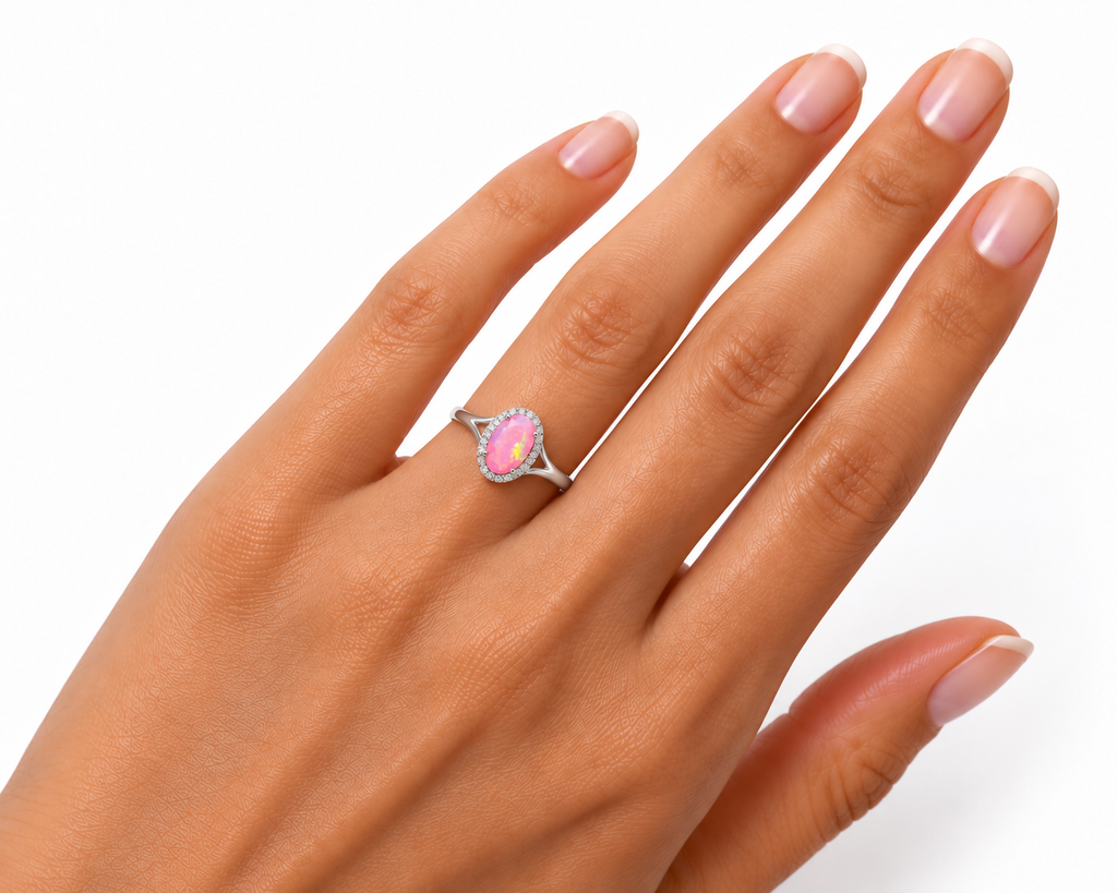 Pink Fire Opal Ring on a Hand Model with a white background