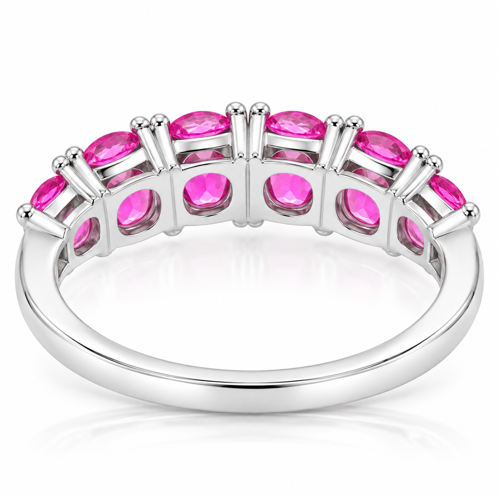 Underside and gallery view of a natural pink sapphire band ring with 3x4mm gemstones in 925 sterling silver.