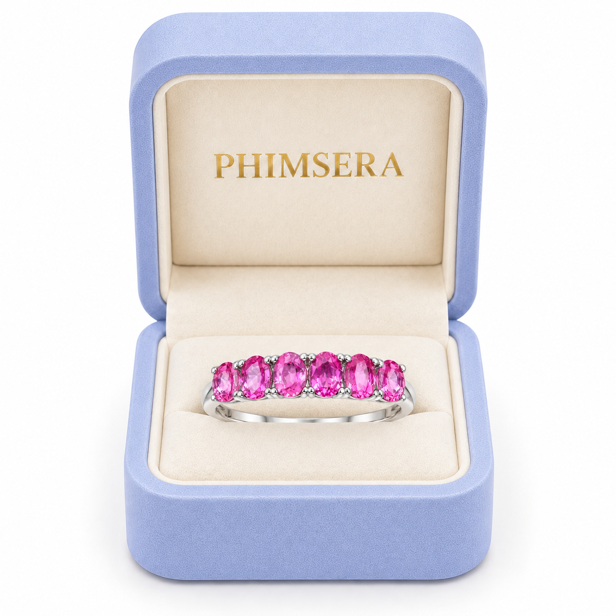 Phimsera natural pink sapphire band ring presented in a luxury jewelry box.