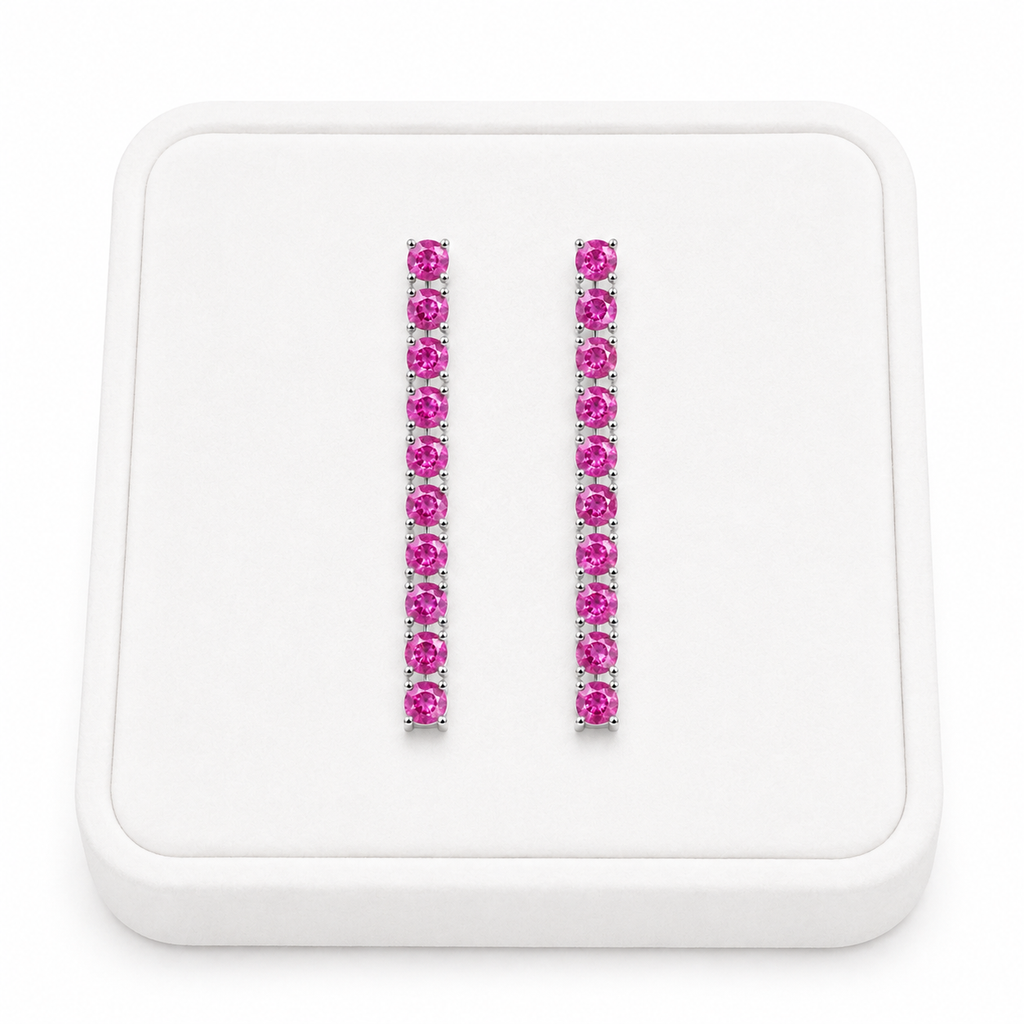 Natural 3mm Pink Sapphire dangle earrings displayed on a white velvet jewelry tray