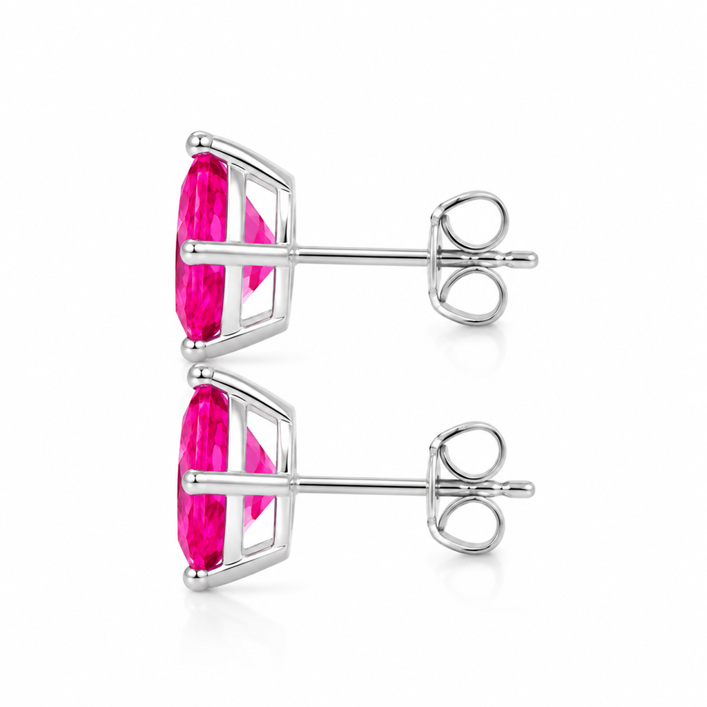 Natural pink topaz pear stud earrings in 925 sterling silver side angle view