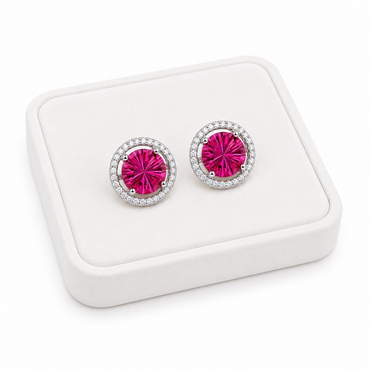 Natural 8mm pink topaz Firework Cut earrings displayed on a white jewelry tray