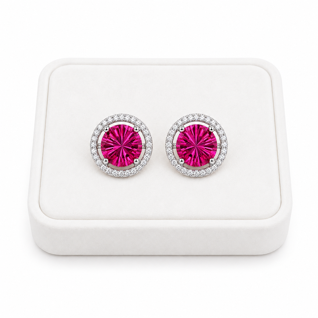 Natural 8mm pink topaz Firework Cut earrings displayed on a white jewelry tray