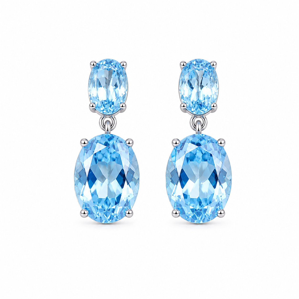 Natural Sky Blue Topaz drop earrings with 4x6mm and 8x10mm oval gemstones