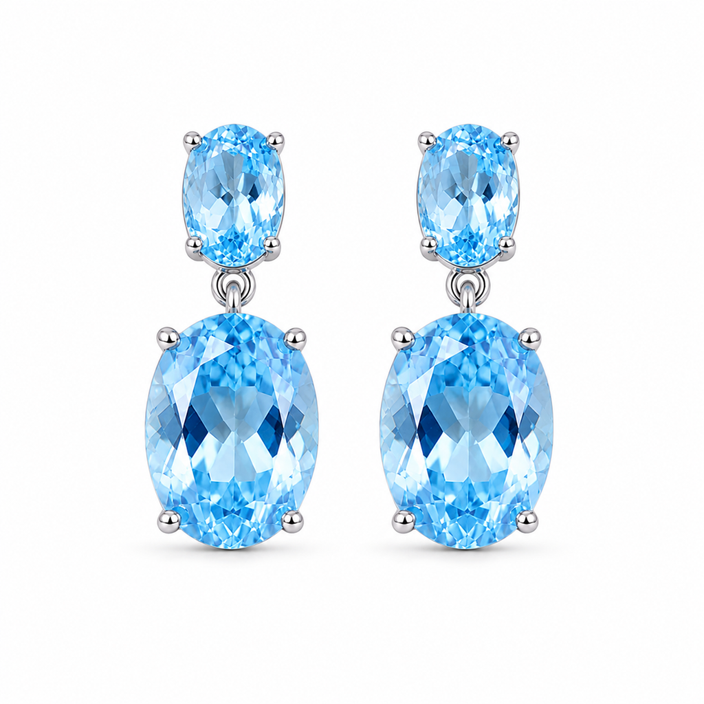 Front view of natural Sky Blue Topaz earrings with graduated oval gemstones