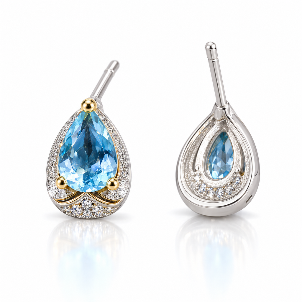 Angled Sky Blue Topaz pear cut earrings with 4x6mm blue gemstones