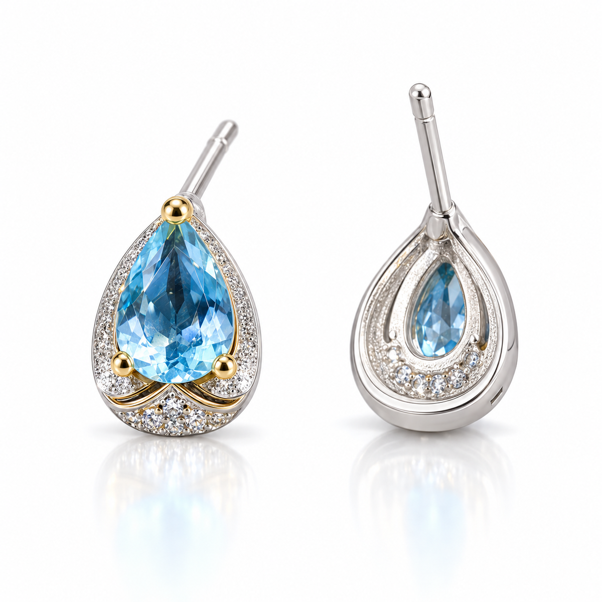 Angled Sky Blue Topaz pear cut earrings with 4x6mm blue gemstones