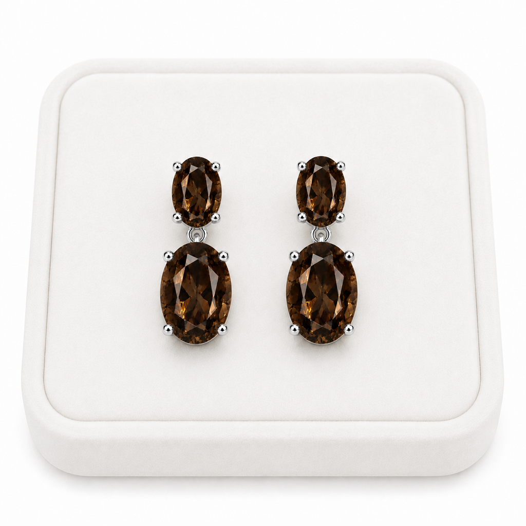 Natural smoky quartz dangle earrings with 4x6mm and 8x10mm oval gemstones on a White Tray