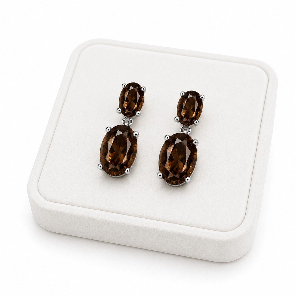 Natural smoky quartz dangle earrings with 4x6mm and 8x10mm oval gemstones on a White Tray