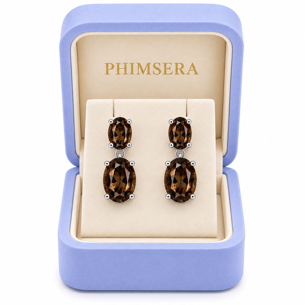 Natural smoky quartz dangle earrings with 4x6mm and 8x10mm oval gemstones in a Phimsera Box