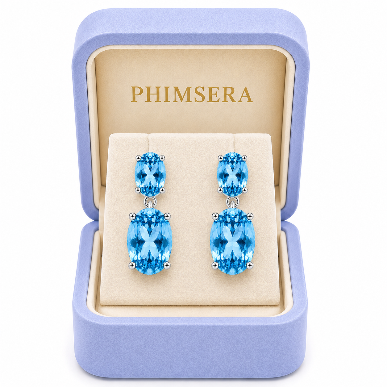 Phimsera Swiss Blue Topaz dangle earrings presented in a luxury jewelry box
