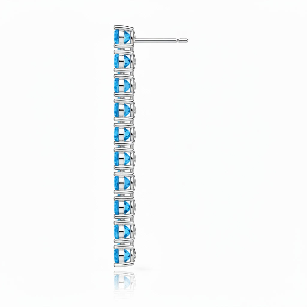 Side view showing the gemstone settings and construction of Swiss Blue Topaz dangle earrings